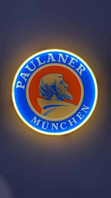 Paulaner München LED-Leuchtschild rund mit Logo in warmweißem Licht